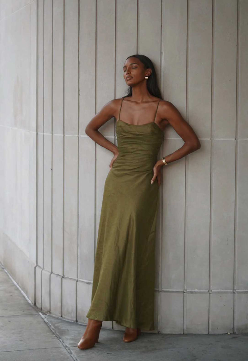 Jasmine Tookes in the Clarice Pleated Linen-Blend Maxi Dress in olive green by Aje at Rites