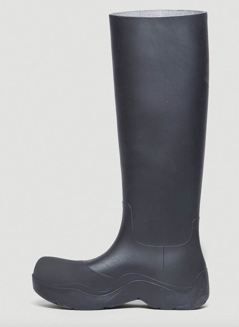 Shop the black Puddle Boots Long by Bottega Veneta at Rites London