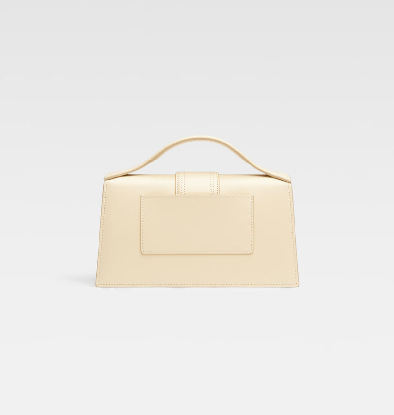 Shop the Le Grand Bambino Bag in Ivory by Jacquemus at Rites London