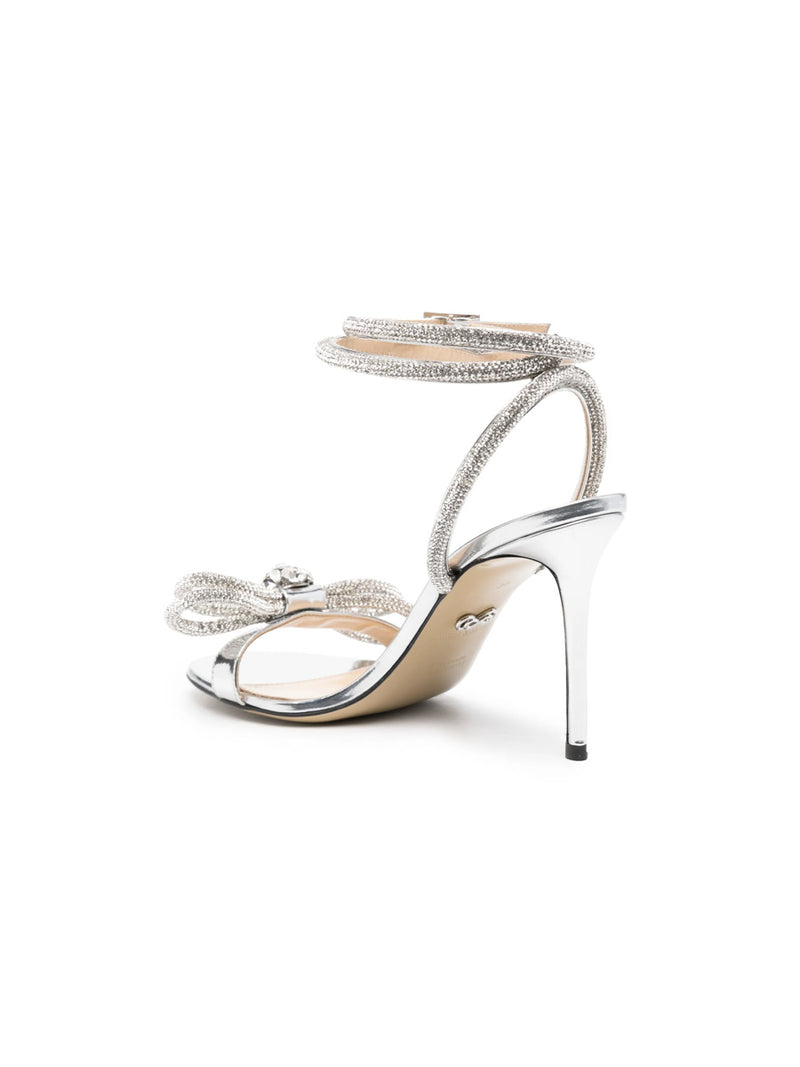 Shop the Double Bow Crystal Embellished Sandals in silver leather by Mach & Mach at Rites London