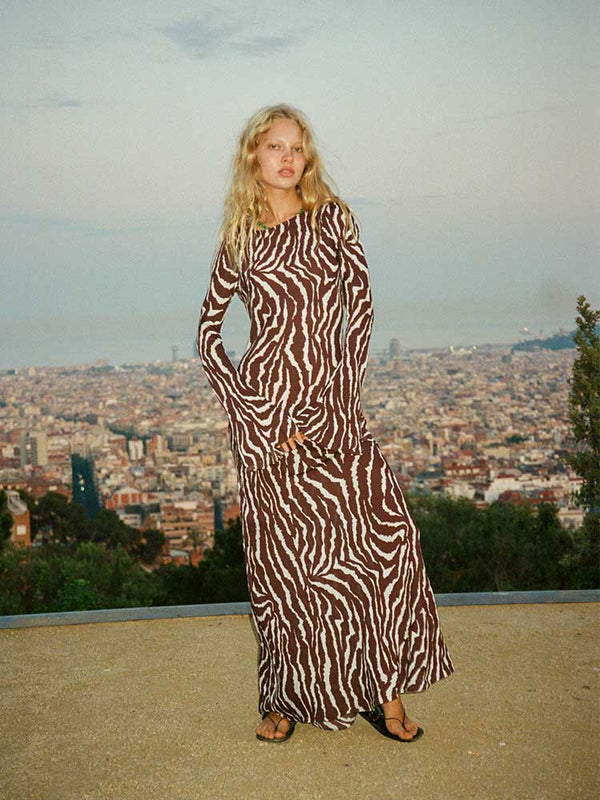 Rent the Gia Maxi Dress in animal print by Realisation Par