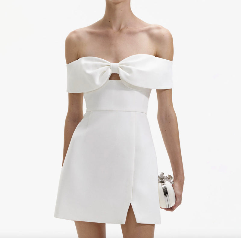 Rent Self Portrait White Bow Off-Shoulder Crpe Mini Dress | Rites Rental Rent Self Portrait White Bow Off-Shoulder Crpe Mini Dress | Rites Rental