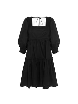 Rent the Bahni Mini Dress in black cotton from Three Graces London