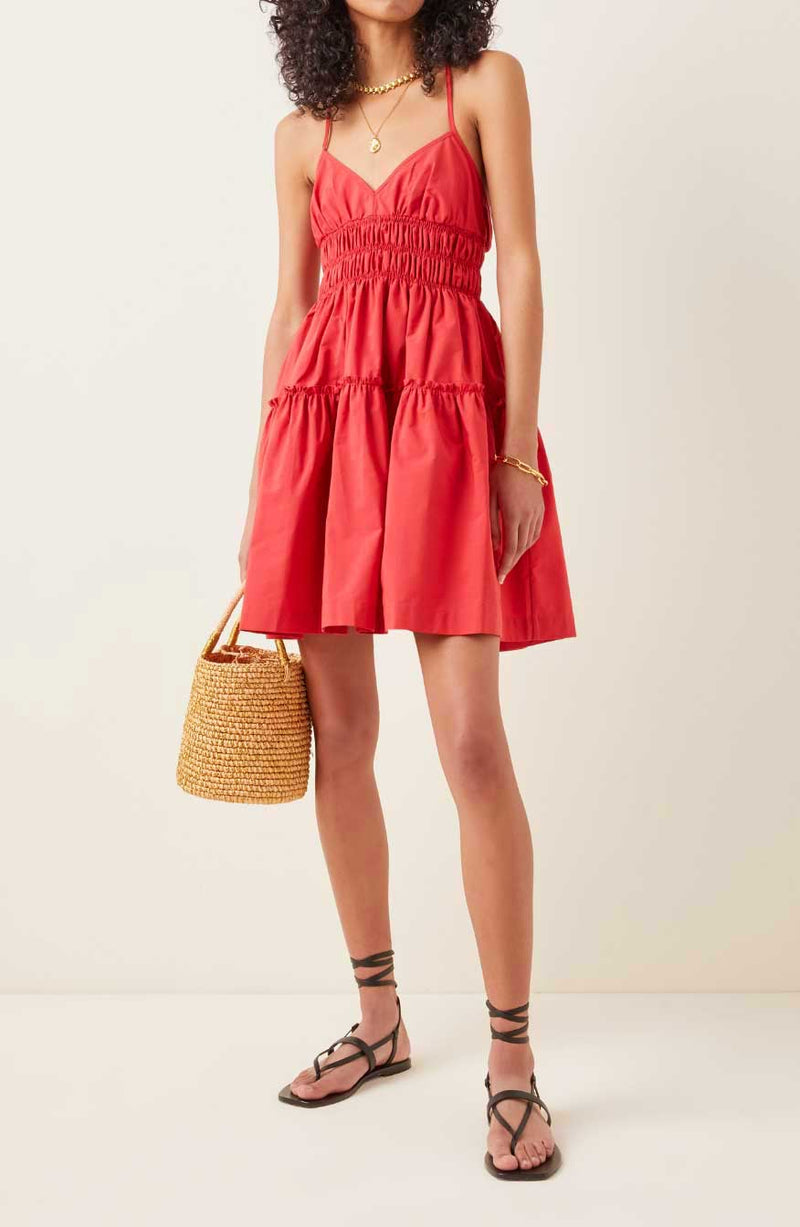 Rent the Mia Smocked Mini Dress in red from Three Graces London